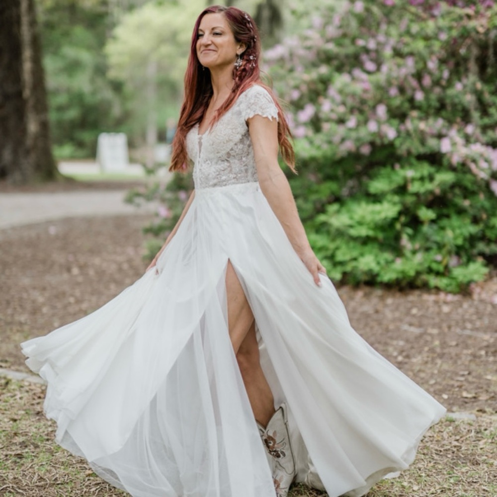 Mikaella wedding dress! Really soft and flowy -Very easy to dance in!! :)